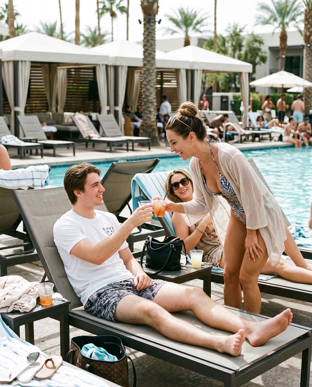 Pool day club cheers in a white Cub Tee
