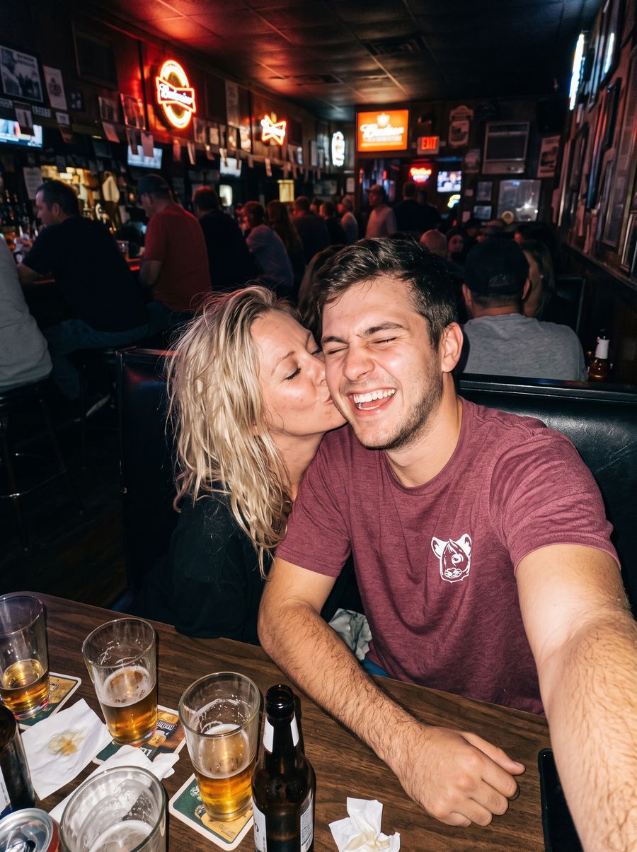 Couple selfie at a bar, Cub Tee